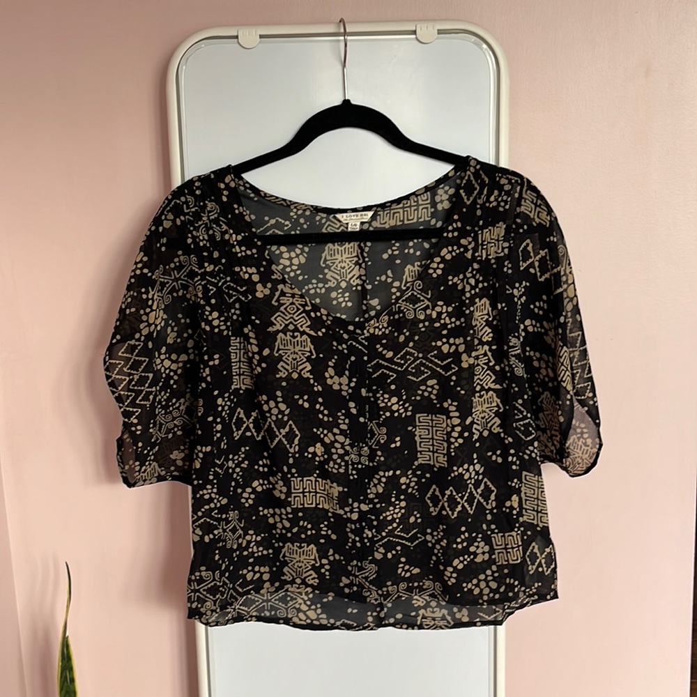 Sheer black t-shirt with tan Aztec design